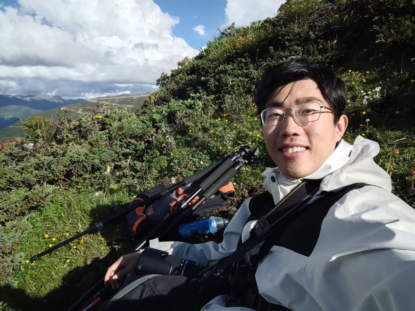 Haoyu Wang hiking in the mountains